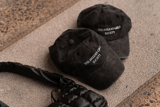 ‘The Anxious Girls Society’ baseball hat in black